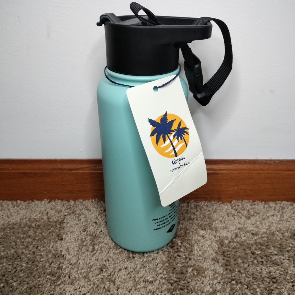 Corona 32 oz hydro flask insulated steel blue bottle.
